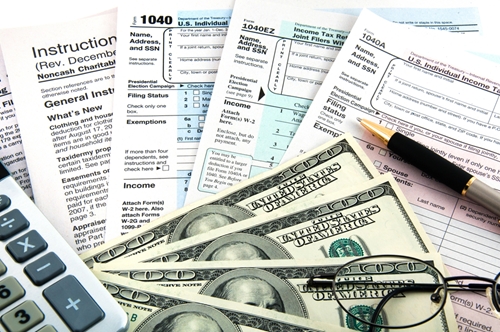 Items needed for tax preparation: tax forms, money, calculator