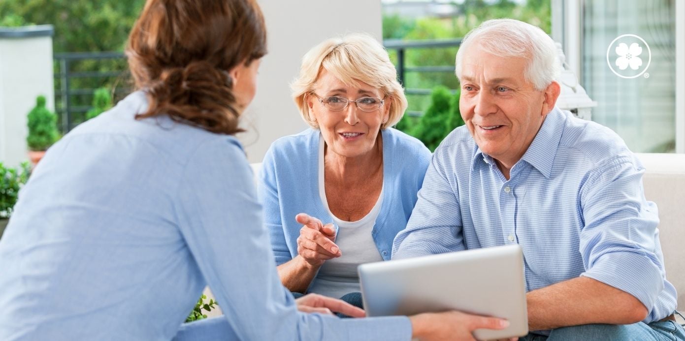 elderly couple with realtor