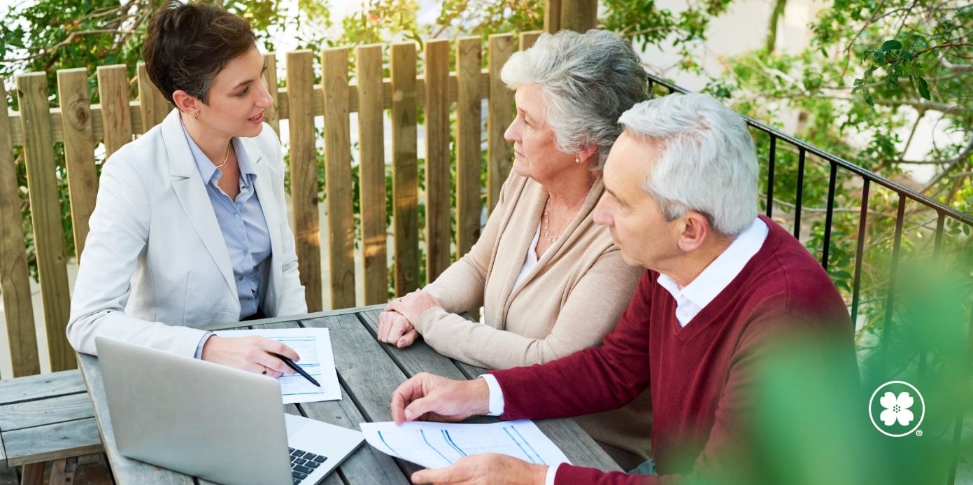 Elderly couple working with a financial planner
