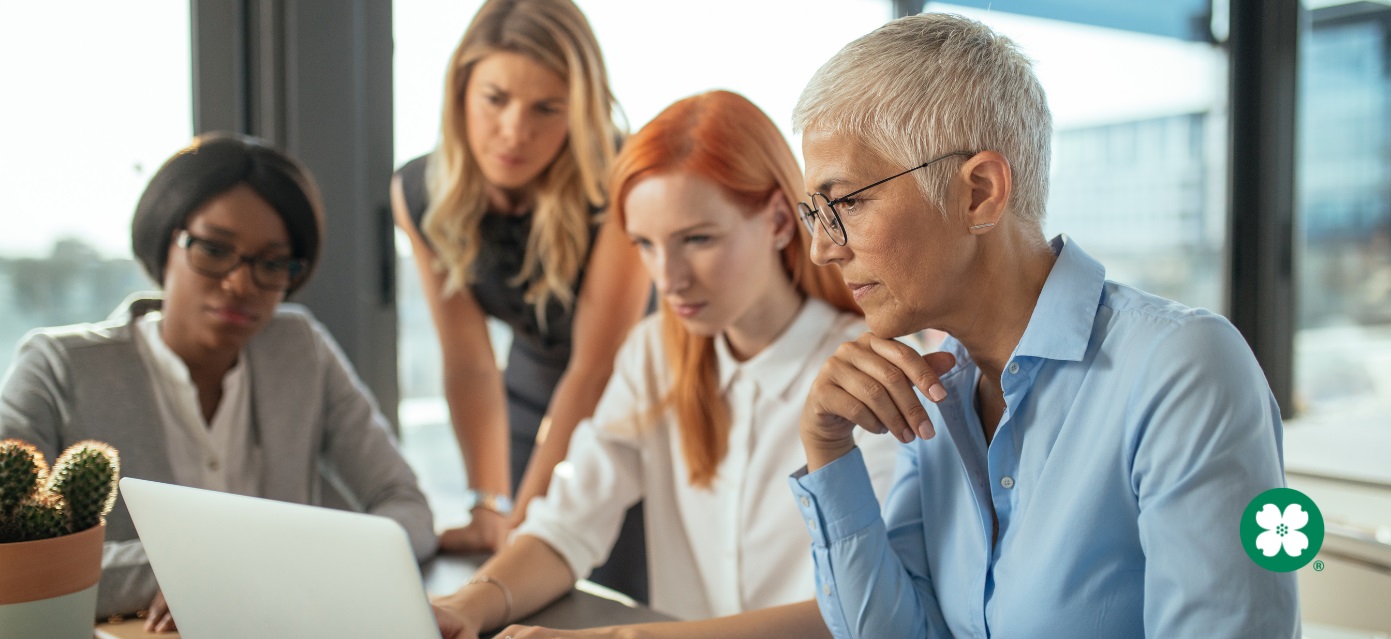 Group of women working together in business setting