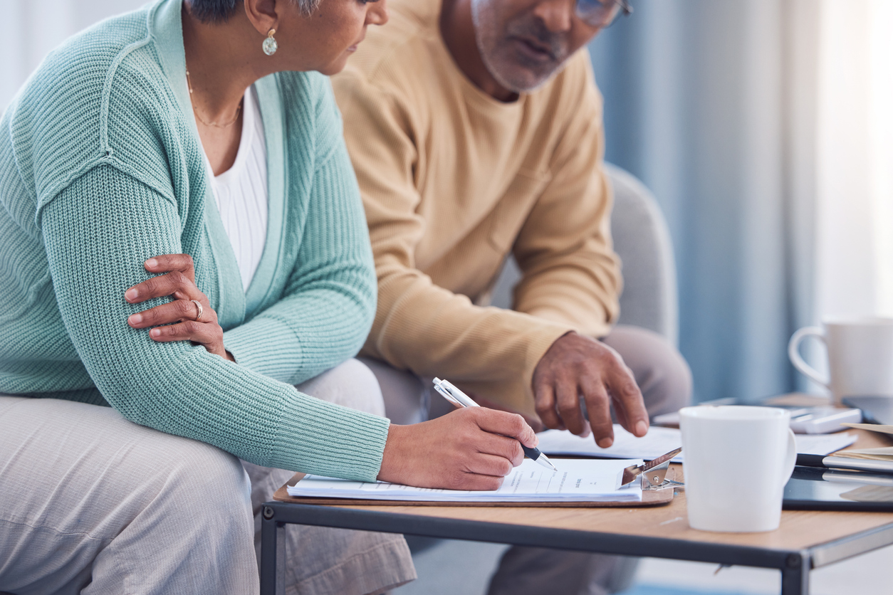 Man and Woman looking over documents